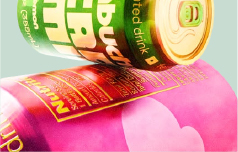 close up of 2 drinks can on top of each other
